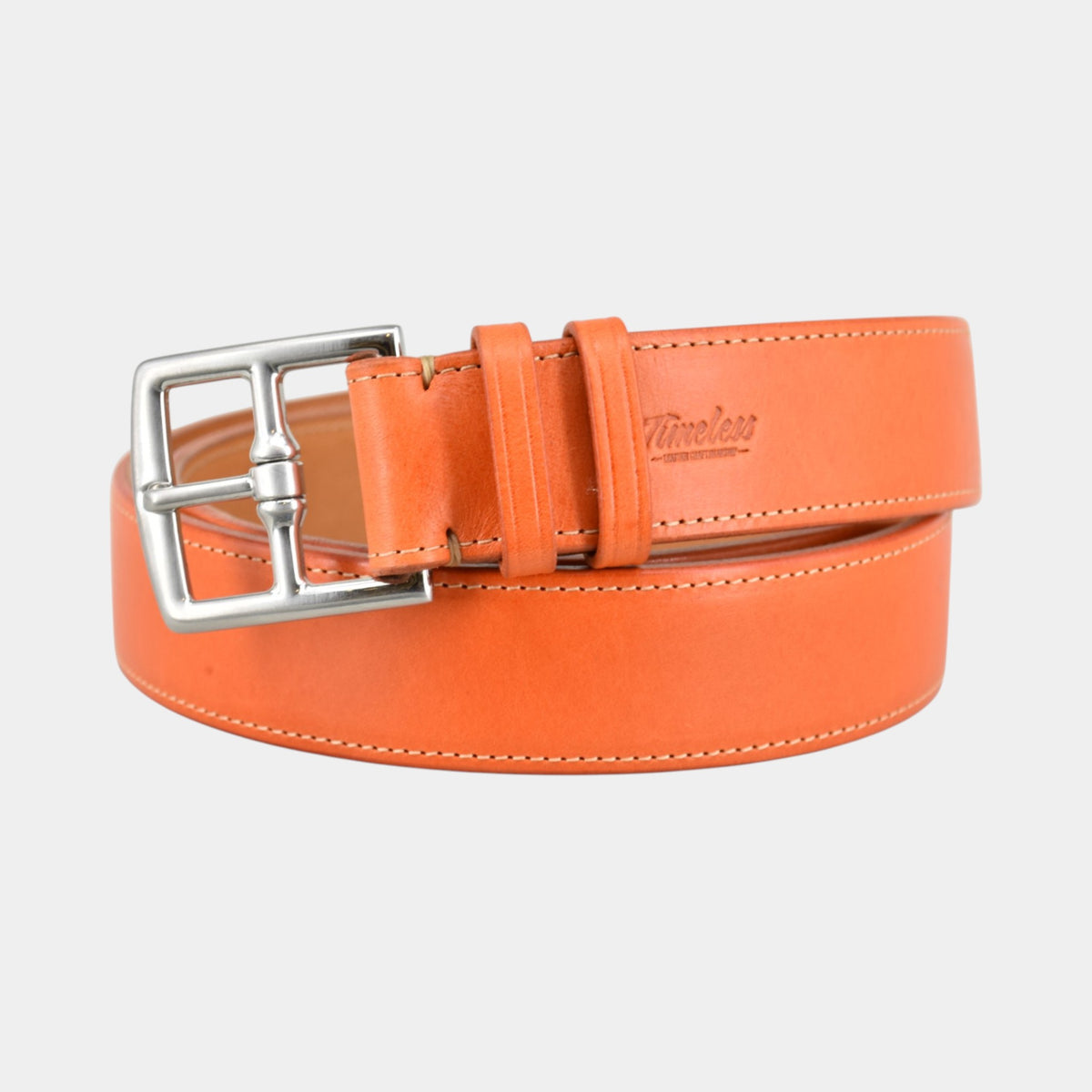 Ledergürtel in orange farbendem Leder und einer silberner Schnalle aus Edelstahl